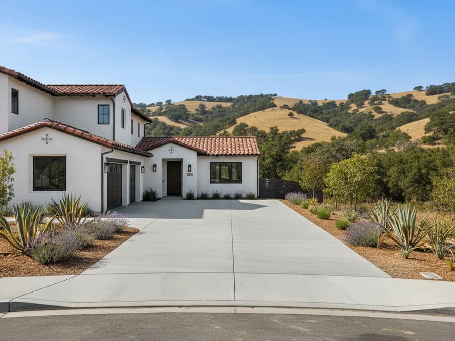 Illustration of a freshly poured concrete driveway in front of a home